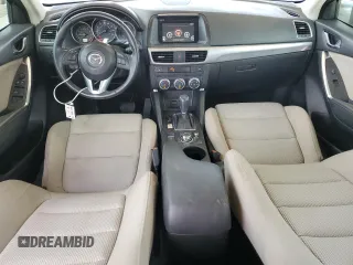 2016 Mazda CX-5 Touring with VIN JM3KE2CY9G0834048, listed as a Copart auction lot 54491535 with 116,328 mi miles and Salvage Title. Bid and sale history available at DreamBid. Image 8.