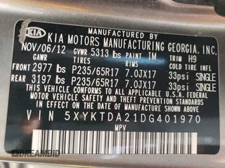 2013 Kia Sorento LX with VIN 5XYKTDA21DG401970, listed as a Copart auction lot 54079365 with 217,969 mi miles and Salvage title. Bid and sale history available at DreamBid. Image 14.