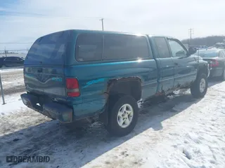 1998 Dodge Ram 1500 with VIN 3B7HF13Z4WG191315, listed as a IAAI auction lot 41643173 with 222,200 mi miles. Bid and sale history available at carsss.com. Image 4.