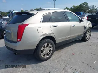 2013 Cadillac SRX Luxury Collection with VIN 3GYFNCE3XDS632366, listed as a IAAI auction lot 42231784 with 85,591 mi miles and . Bid and sale history available at DreamBid. Image 4.