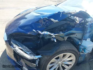 2018 Tesla Model S 75D with VIN 5YJSA1E2XJF285301, listed as a IAAI auction lot 41917939 with 80,470 mi miles. Bid and sale history available at carsss.com. Image 6.