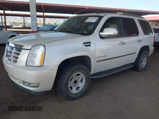 2007 Cadillac Escalade z VIN 1GYEC63897R329524, wystawiony jako IAAI lot #42360946 z przebiegiem 258 041 mil mil oraz . Historia ofert i sprzedaży dostępna na DreamBid. Obrazek 2.