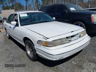 1995 Ford Crown Victoria LX с VIN 2FALP74W0SX127938, выставлен на аукционе IAAI как лот 41861885 с пробегом 173 196 миль миль и . История ставок и продаж доступна на DreamBid. Изображение 1.