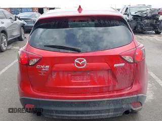 2015 Mazda CX-5 Grand Touring with VIN JM3KE4DY1F0540586, listed as a IAAI auction lot 41710216 with 148,800 mi miles. Bid and sale history available at carsss.com. Image 16.