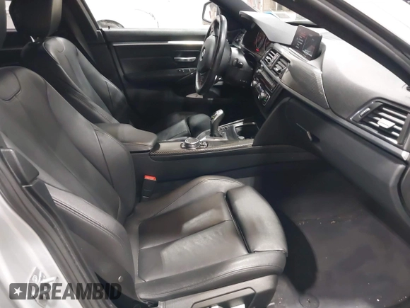 2016 BMW 4 Series 428i xDrive with VIN WBA4C9C5XGG138843, listed as a IAAI auction lot 41747358 with 63,804 mi miles and . Bid and sale history available at DreamBid. Image 5.