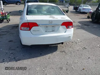 2010 Honda Civic LX with VIN 2HGFA1F54AH533810, listed as a IAAI auction lot 42171253 with 211,551 mi miles and . Bid and sale history available at DreamBid. Image 6.
