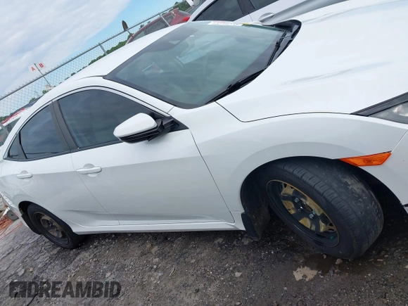 2020 Honda Civic LX с VIN 19XFC2F67LE015275, выставлен на аукционе IAAI как лот 42199717 с пробегом 141 018 миль миль и . История ставок и продаж доступна на DreamBid. Изображение 13.