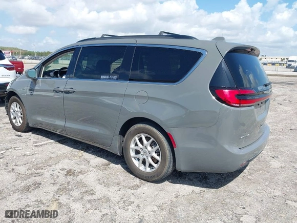 2022 Chrysler Pacifica Touring L with VIN 2C4RC1BG4NR113946, listed as a IAAI auction lot 41884076 with 73,209 mi miles. Bid and sale history available at carsss.com. Image 3.