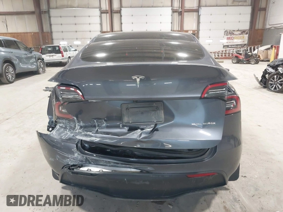 2023 Tesla Model Y Long Range with VIN 7SAYGAEE2PF755674, listed as a IAAI auction lot 41890025 with 24,783 mi miles and . Bid and sale history available at DreamBid. Image 16.