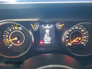 2020 Jeep Wrangler Unlimited Black and Tan with VIN 1C4HJXDG1LW267312, listed as a Copart auction lot 49658135 with 66,624 mi miles and Salvage title. Bid and sale history available at DreamBid. Image 9.