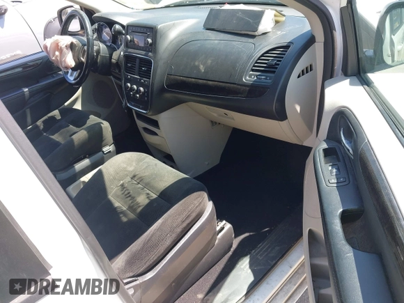 2016 Dodge Grand Caravan SE with VIN 2C4RDGBG2GR311654, listed as a IAAI auction lot 42056032 with 185,330 mi miles and . Bid and sale history available at DreamBid. Image 5.