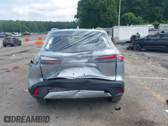2023 Toyota Corolla Cross XLE with VIN 7MUDAAAG0PV057750, listed as a IAAI auction lot 42302284 with 31,404 mi miles and . Bid and sale history available at DreamBid. Image 16.