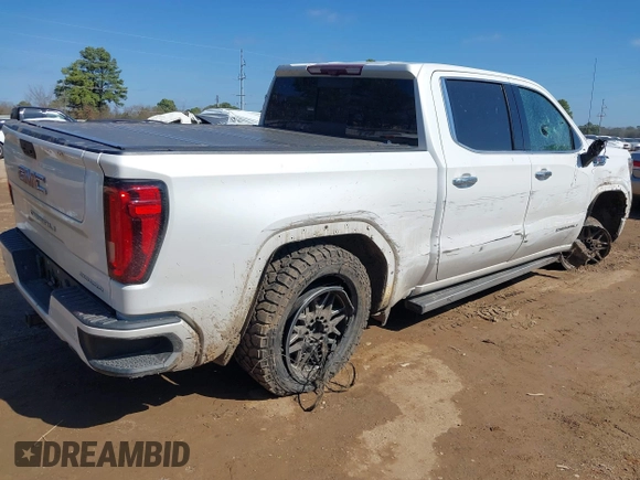2020 GMC Sierra 1500 Denali z VIN 1GTU9FEL7LZ152659, wystawiony jako IAAI lot #41662492 z przebiegiem 101 222 mil mil oraz . Historia ofert i sprzedaży dostępna na DreamBid. Obrazek 4.