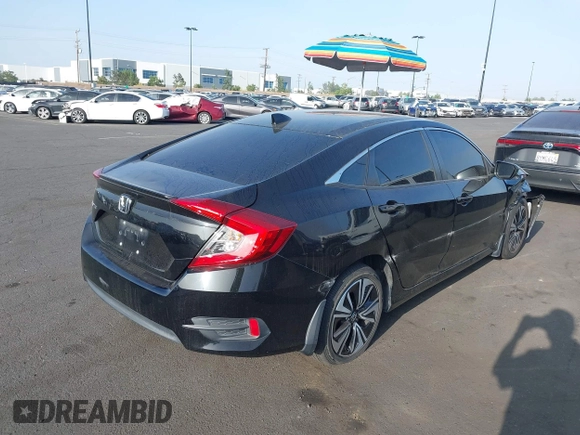 2016 Honda Civic EX-L with VIN 2HGFC1F79GH659164, listed as a IAAI auction lot 42455097 with 166,157 mi miles and . Bid and sale history available at DreamBid. Image 4.
