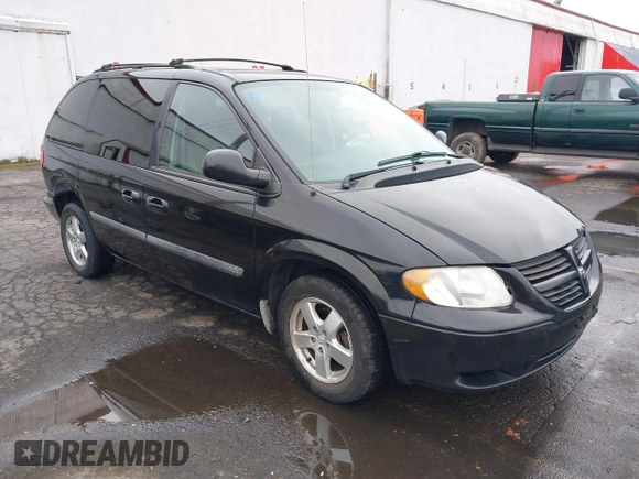 2007 Dodge Caravan SXT with VIN 1D4GP45R87B161237, listed as a IAAI auction lot 41594127 with 154,508 mi miles and . Bid and sale history available at DreamBid. Image 1.