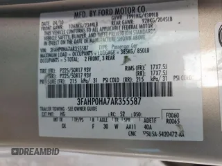 2010 Ford Fusion SE z VIN 3FAHP0HA7AR355587, wystawiony jako Copart lot #53390305 z przebiegiem 160 598 mil mil oraz Czysty tytuł • Clean title. Historia ofert i sprzedaży dostępna na DreamBid. Obrazek 14.