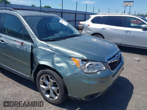 2016 Subaru Forester Touring with VIN JF2SJAVCXGH490507, listed as a IAAI auction lot 42070715 with 98,456 mi miles and . Bid and sale history available at DreamBid. Image 6.