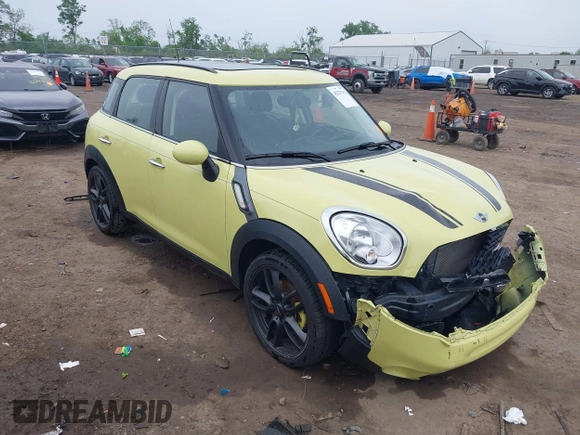 2012 MINI Countryman S z VIN WMWZC3C59CWL82955, wystawiony jako IAAI lot #42237702 z przebiegiem 61 903 mil mil oraz . Historia ofert i sprzedaży dostępna na DreamBid. Obrazek 1.