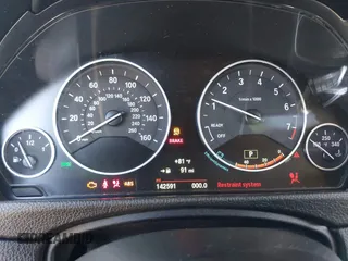 2015 BMW 3 Series 328i with VIN WBA3C1C50FK124300, listed as a IAAI auction lot 40112372 with 142,591 mi miles and . Bid and sale history available at carsss.com. Image 7.