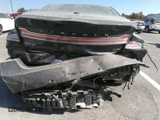 2013 Lincoln MKZ Hybrid с VIN 3LN6L2LU2DR810114, выставлен на аукционе IAAI как лот 40903368 с пробегом 102 538 миль миль и . История ставок и продаж доступна на DreamBid. Изображение 6.