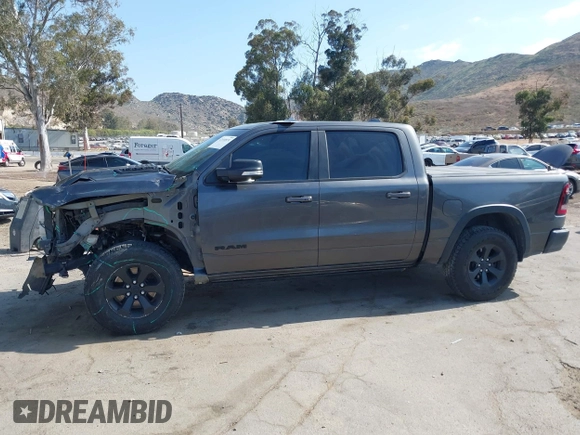 2019 Ram 1500 Rebel z VIN 1C6SRFLT2KN696557, wystawiony jako IAAI lot #42110931 z przebiegiem 81 372 mil mil oraz . Historia ofert i sprzedaży dostępna na DreamBid. Obrazek 14.