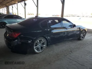2014 BMW 7 Series ALPINA B7 z VIN WBAYE8C54ED136428, wystawiony jako Copart lot #61866855 z przebiegiem 126 118 mil mil oraz Szkoda całkowita • Salvage title. Historia ofert i sprzedaży dostępna na DreamBid. Obrazek 3.