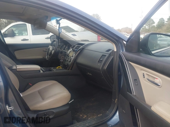 2014 Mazda CX-9 Touring with VIN JM3TB2CA0E0427183, listed as a IAAI auction lot 41734192 with 93,272 mi miles and . Bid and sale history available at carsss.com. Image 5.
