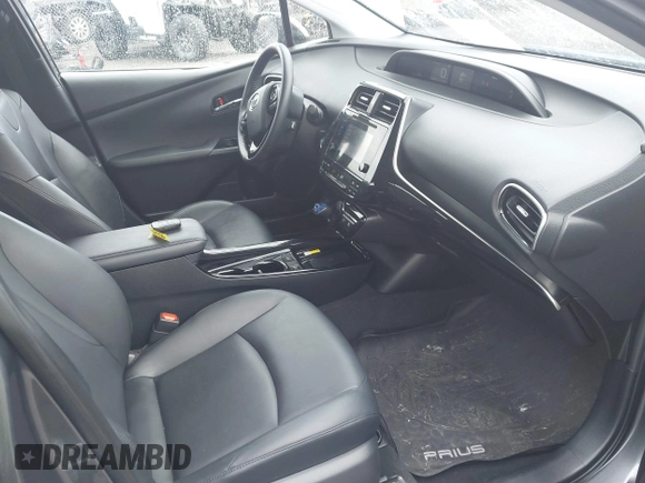2019 Toyota Prius L Eco z VIN JTDKARFU7K3077941, wystawiony jako IAAI lot #41865759 z przebiegiem 254 612 mil mil oraz . Historia ofert i sprzedaży dostępna na DreamBid. Obrazek 5.