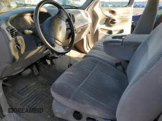 1998 Ford F-150 z VIN 1FTZX18W3WKB01774, wystawiony jako Copart lot #88670315 z przebiegiem 102 301 mil mil oraz Szkoda całkowita • Salvage title. Historia ofert i sprzedaży dostępna na DreamBid. Obrazek 7.