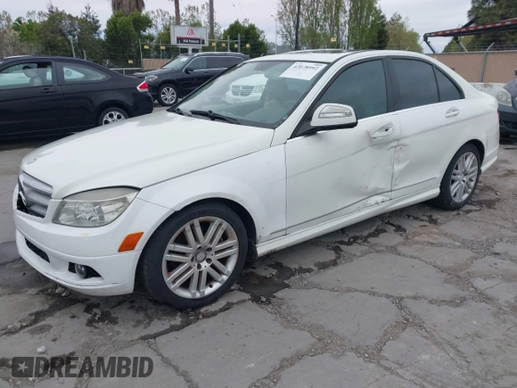 2009 Mercedes-Benz C-Class 3.0L Sport with VIN WDDGF54X19R082613, listed as a IAAI auction lot 42078992 with 140,707 mi miles. Bid and sale history available at carsss.com. Image 2.