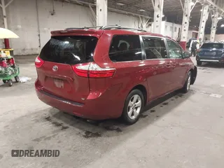 2015 Toyota Sienna LE AAS with VIN 5TDKK3DC2FS609296, listed as a IAAI auction lot 41842166 with 160,342 mi miles. Bid and sale history available at carsss.com. Image 4.