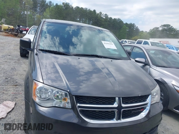 2016 Dodge Grand Caravan SE with VIN 2C4RDGBG2GR345965, listed as a IAAI auction lot 41955192 with 141,531 mi miles and . Bid and sale history available at DreamBid. Image 12.
