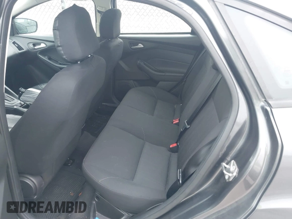 2017 Ford Focus SE with VIN 1FADP3F22HL299398, listed as a IAAI auction lot 41162384 with 121,993 mi miles and . Bid and sale history available at DreamBid. Image 8.