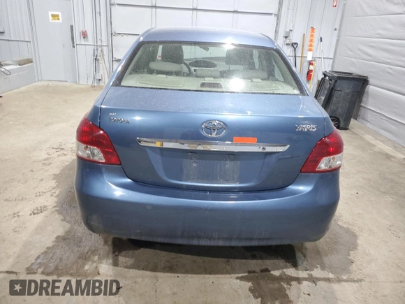 2009 Toyota Yaris with VIN JTDBT903094047243, listed as a Copart auction lot 47296455 with 235,483 mi miles and Salvage Title. Bid and sale history available at DreamBid. Image 6.