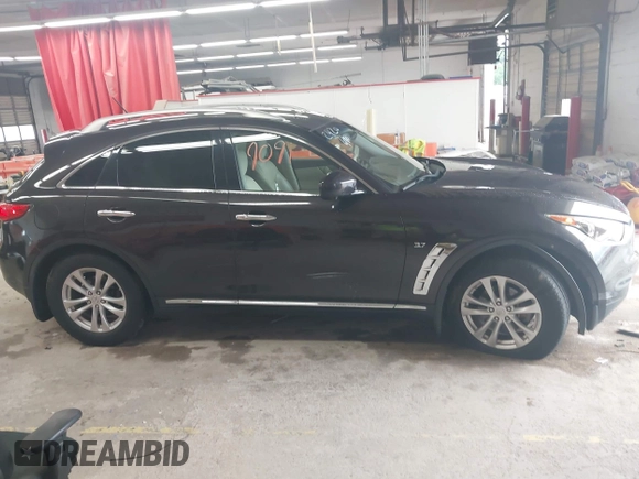 2016 Infiniti QX70 z VIN JN8CS1MW6GM752420, wystawiony jako IAAI lot #42509091 z przebiegiem 55 196 mil mil oraz . Historia ofert i sprzedaży dostępna na DreamBid. Obrazek 13.