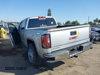 2018 GMC Sierra 1500 SLT with VIN 3GTP1NEC2JG528387, listed as a IAAI auction lot 42598955 with Not provided miles and . Bid and sale history available at DreamBid. Image 3.