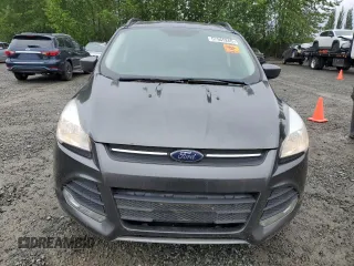 2016 Ford Escape SE z VIN 1FMCU0GX9GUC69200, wystawiony jako Copart lot #57565265 z przebiegiem 131 353 mil mil oraz Czysty tytuł • Clean title. Historia ofert i sprzedaży dostępna na DreamBid. Obrazek 5.