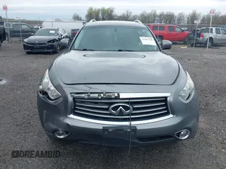 2016 Infiniti QX70 z VIN JN8CS1MW0GM400207, wystawiony jako IAAI lot #41952548 z przebiegiem 146 943 mil mil oraz . Historia ofert i sprzedaży dostępna na DreamBid. Obrazek 12.