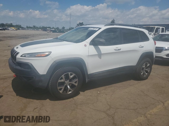 2015 Jeep Cherokee Trailhawk with VIN 1C4PJMBSXFW651000, listed as a Copart auction lot 64110515 with 135,571 mi miles and Clean title. Bid and sale history available at DreamBid. Image 1.