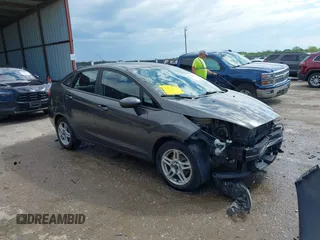 2017 Ford Fiesta SE z VIN 3FADP4BJ8HM142976, wystawiony jako IAAI lot #42092770 z przebiegiem 165 496 mil mil oraz . Historia ofert i sprzedaży dostępna na DreamBid. Obrazek 1.