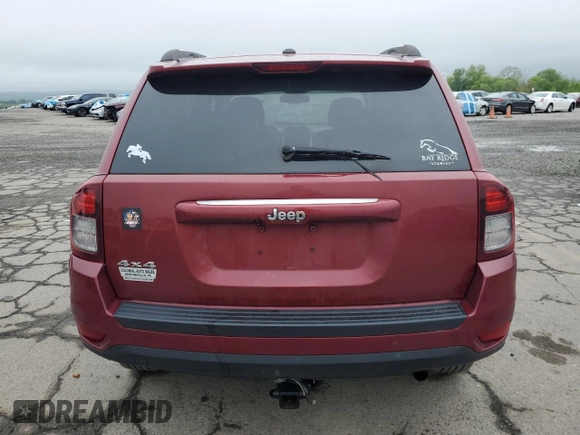 2016 Jeep Compass Latitude with VIN 1C4NJDEB7GD573274, listed as a Copart auction lot 55569755 with 175,162 mi miles and Salvage Title. Bid and sale history available at DreamBid. Image 6.