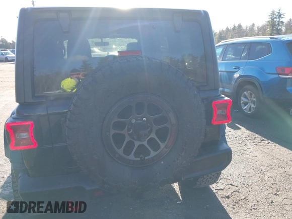 2023 Jeep Wrangler Rubicon with VIN 1C4JJXFGXPW682231, listed as a IAAI auction lot 41110264 with 15,147 mi miles and . Bid and sale history available at DreamBid. Image 16.