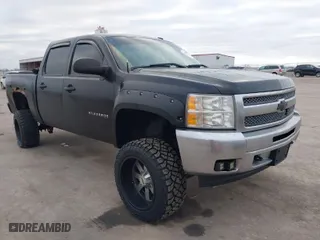 2012 Chevrolet Silverado 1500 LT with VIN 1GCPKSE72CF196471, listed as a IAAI auction lot 41294801 with 155,000 mi miles. Bid and sale history available at carsss.com. Image 1.