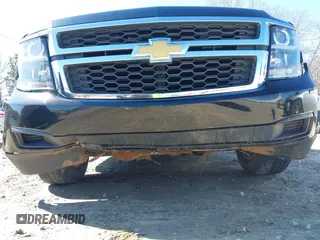2018 Chevrolet Tahoe LT z VIN 1GNSCBKC7JR254859, wystawiony jako IAAI lot #41620074 z przebiegiem 124 714 mil mil oraz . Historia ofert i sprzedaży dostępna na DreamBid. Obrazek 6.