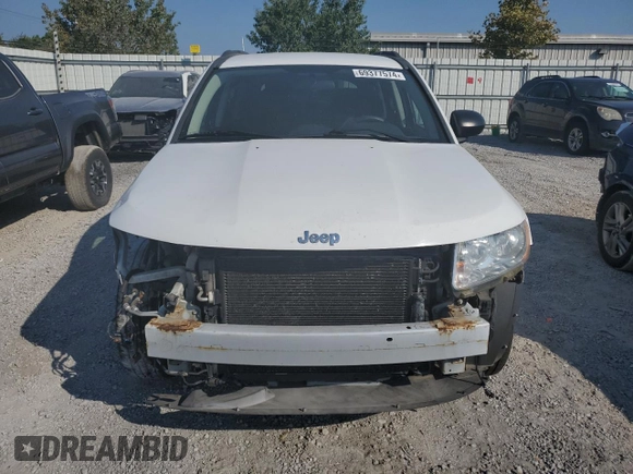 2011 Jeep Compass with VIN 1J4NT1FA3BD240927, listed as a Copart auction lot 69377574 with 71,061 mi miles and Salvage Title. Bid and sale history available at carsss.com. Image 5.