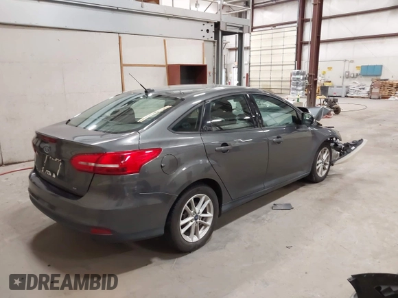 2017 Ford Focus SE with VIN 1FADP3F28HL314308, listed as a IAAI auction lot 42175299 with 74,917 mi miles and . Bid and sale history available at DreamBid. Image 4.