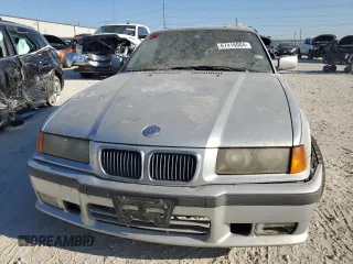 1999 BMW 3 Series 328is with VIN WBABG1338XET08298, listed as a Copart auction lot 67416004 with 0 mi miles and Clean Title. Bid and sale history available at carsss.com. Image 5.