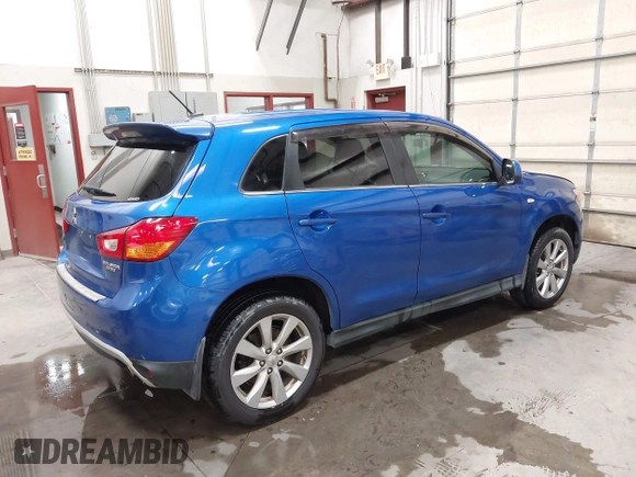 2015 Mitsubishi Outlander SE with VIN 4A4AR4AU1FE054804, listed as a IAAI auction lot 42325699 with 106,680 mi miles and . Bid and sale history available at DreamBid. Image 4.