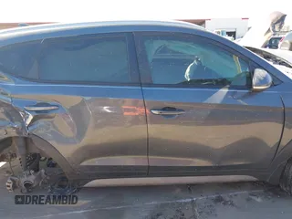 2018 Hyundai Tucson Sport with VIN KM8J33AL5JU770092, listed as a IAAI auction lot 41395349 with 101,395 mi miles. Bid and sale history available at carsss.com. Image 14.