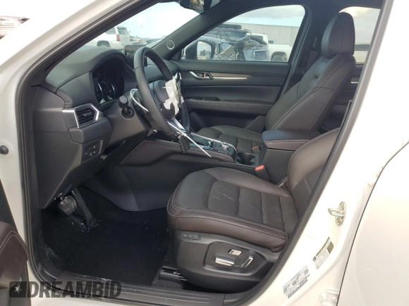 2024 Mazda CX-5 2.5 Turbo Signature with VIN JM3KFBXY7R0518304, listed as a Copart auction lot 42788985 with 8,593 mi miles and Salvage Title. Bid and sale history available at carsss.com. Image 7.